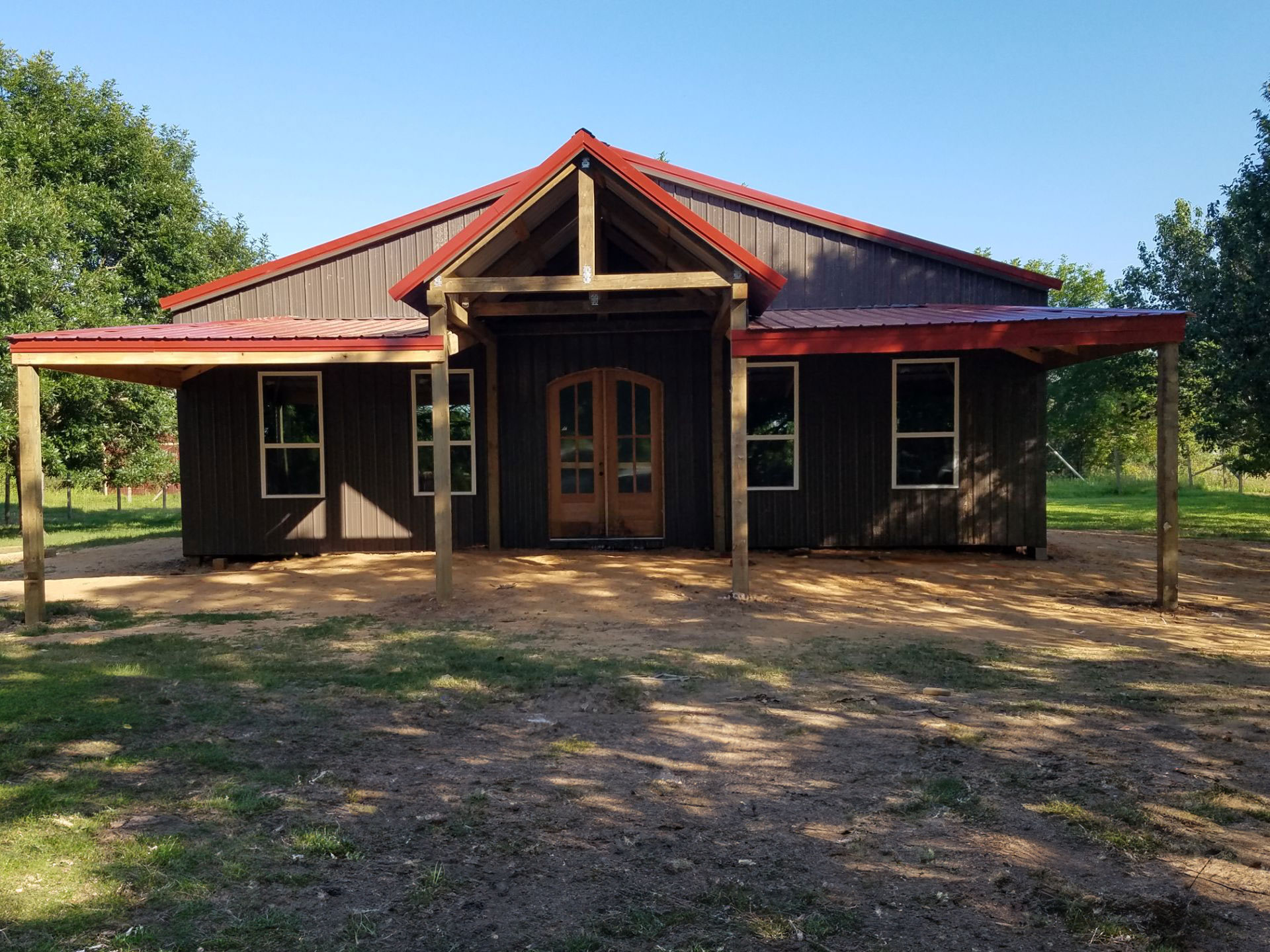A sturdy barn under Texas sky, sunny weather